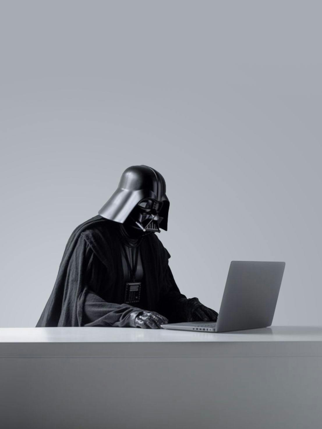 Darth Vader working on computer